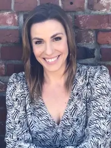 headshot of Trisha Rivera